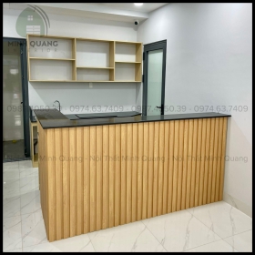 Quầy thu ngân ốp tấm nhựa PVC mang lại một không gian sạch sẽ sang trọng và tính thẩm mỹ cao KT0018